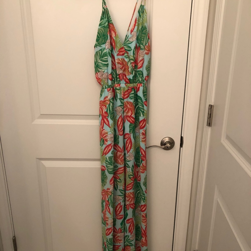 Tropical print halter cross back jumpsuit